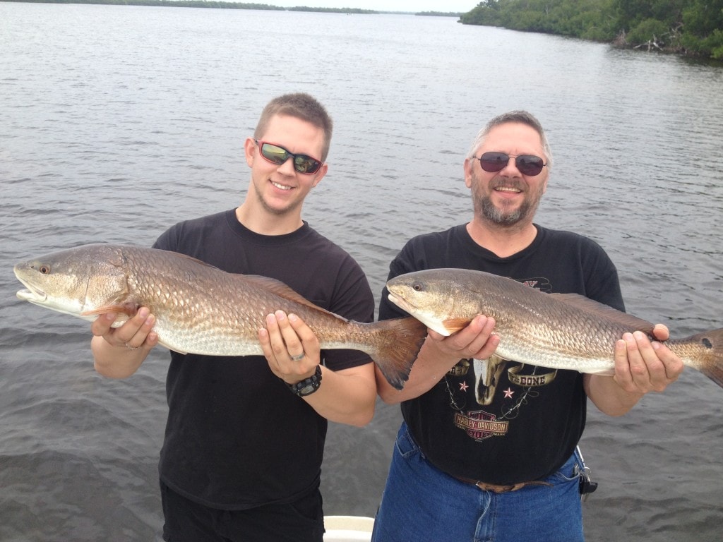 two nice reds on Boca Grande fishing charters