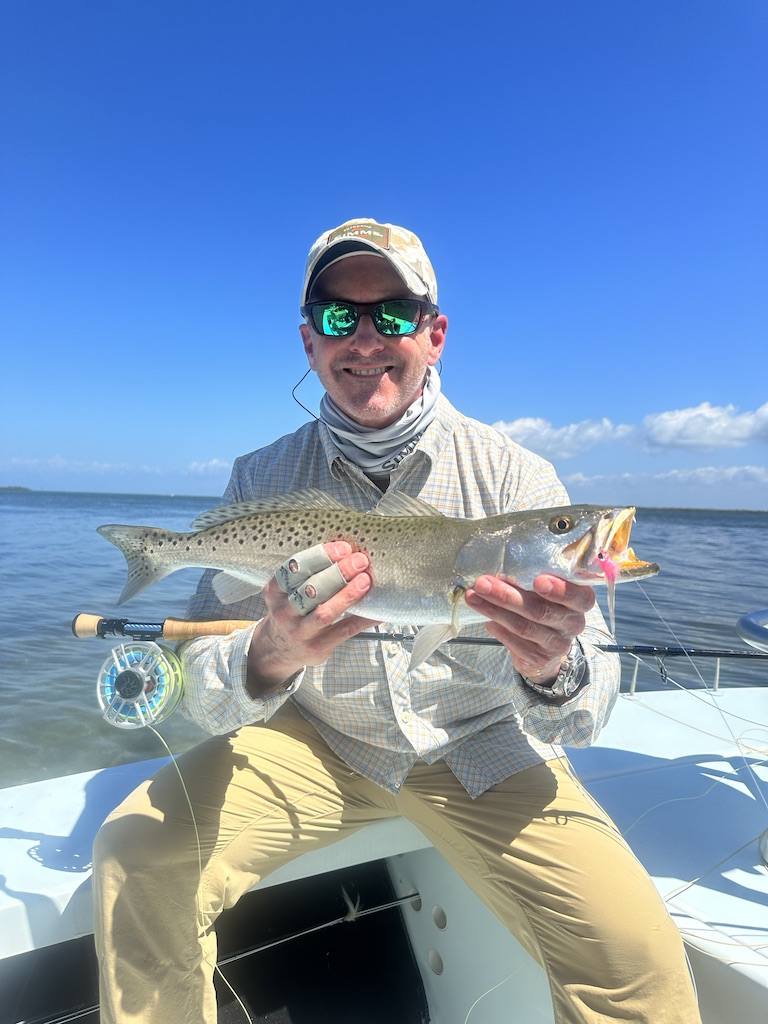 Boca Grande Fly Fishing Trout Charter Spotted seatrout caught on fly tackle during a Boca Grande fly fishing charter