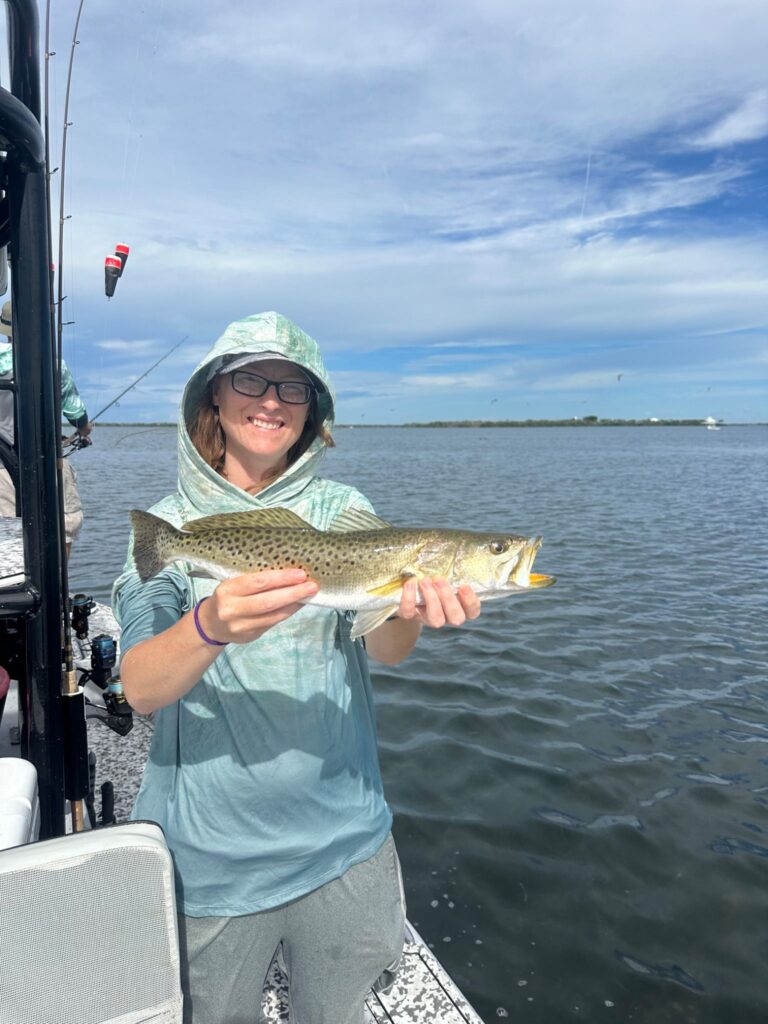 Speckled Trout Fishing – Charlotte Harbor Florida Angler holding a speckled trout caught while fishing Charlotte Harbor in Southwest Florida.